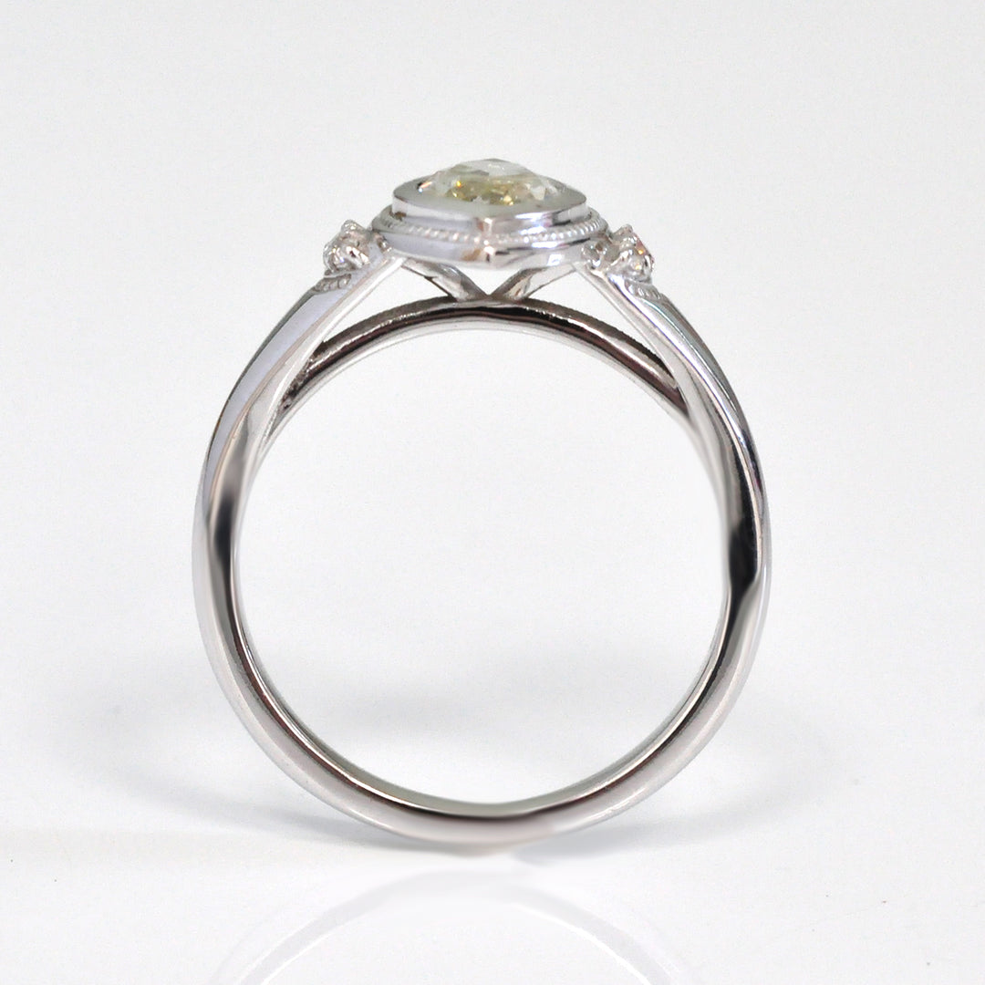 white gold bezel set marquise center diamond ring
