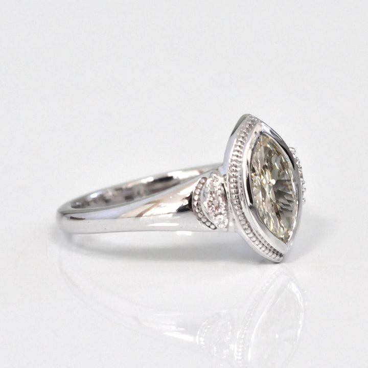 white gold bezel set marquise center diamond ring
