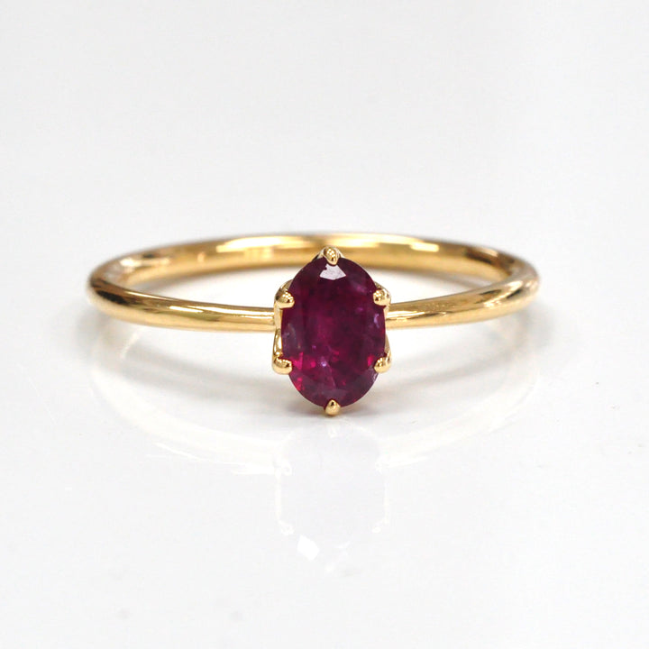 Oval cut red unheated ruby 18k gold Solitaire