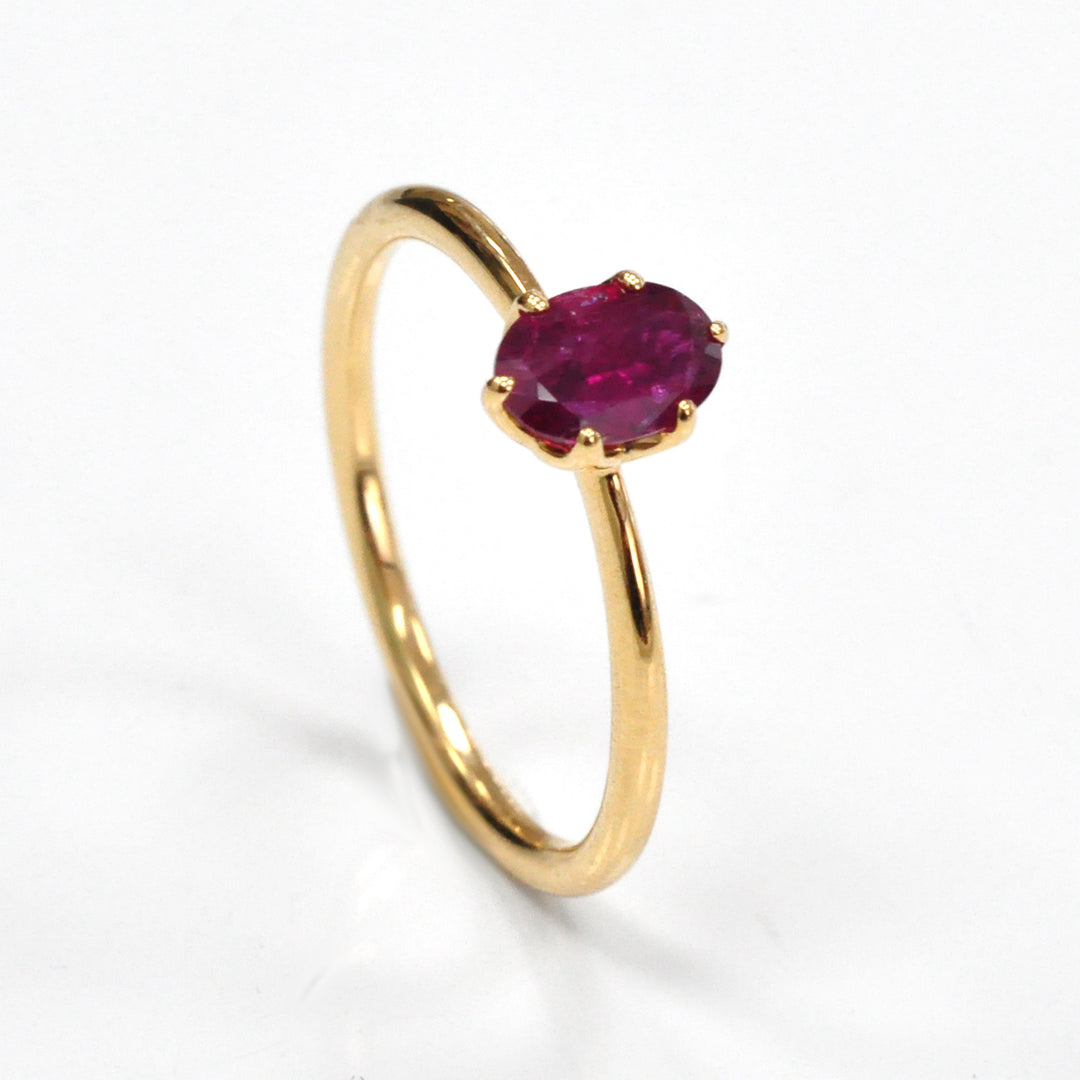Oval cut red unheated ruby 18k gold Solitaire