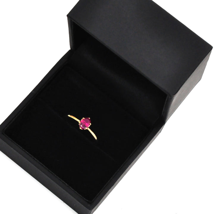 Oval cut red unheated ruby 18k gold Solitaire