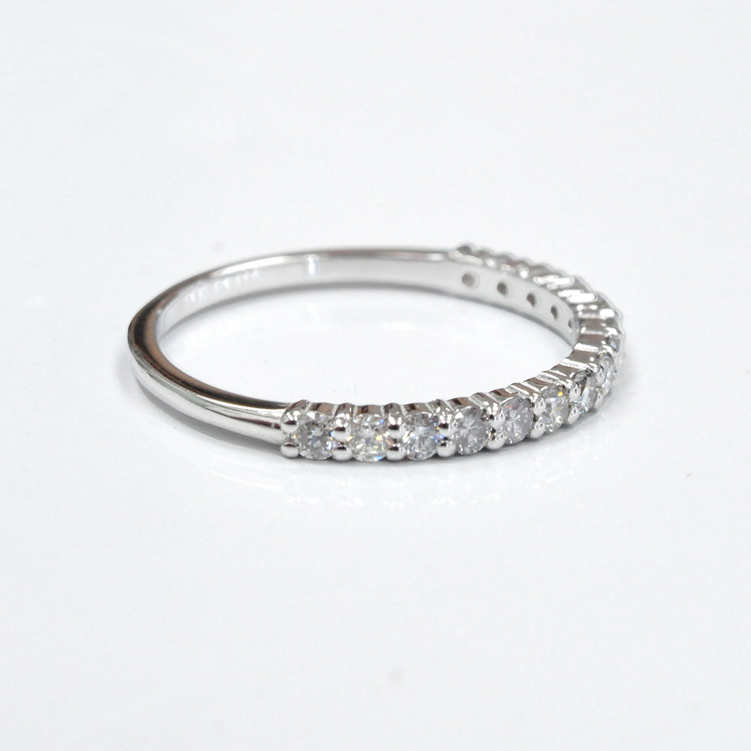 white diamonds white gold half eternity ring