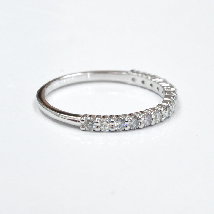 white diamonds white gold half eternity ring