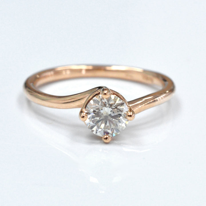 0.62 carat diamond rose gold solitaire engagement ring
