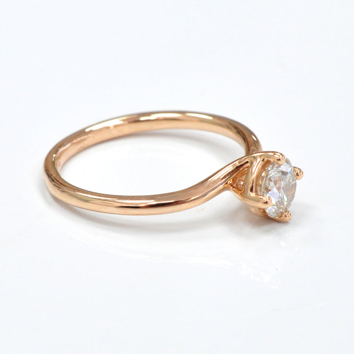 0.62 carat diamond rose gold solitaire engagement ring