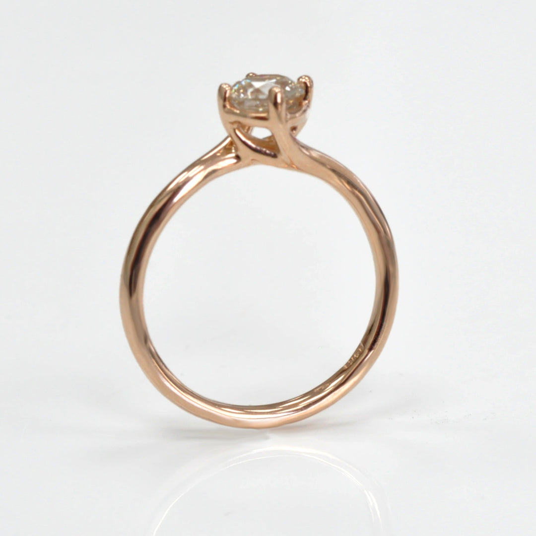 0.62 carat diamond rose gold solitaire engagement ring