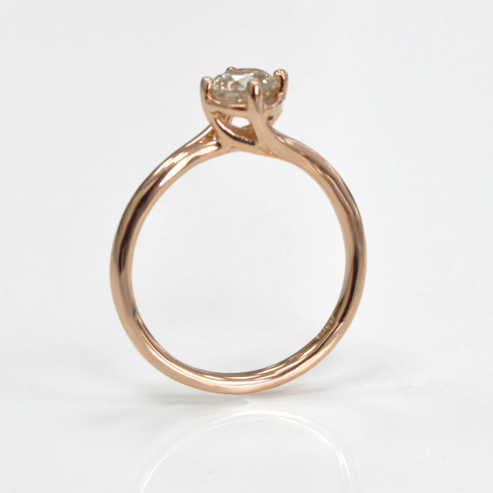 0.62 carat diamond rose gold solitaire engagement ring
