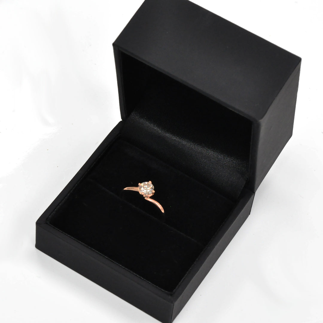 0.62 carat diamond rose gold solitaire engagement ring