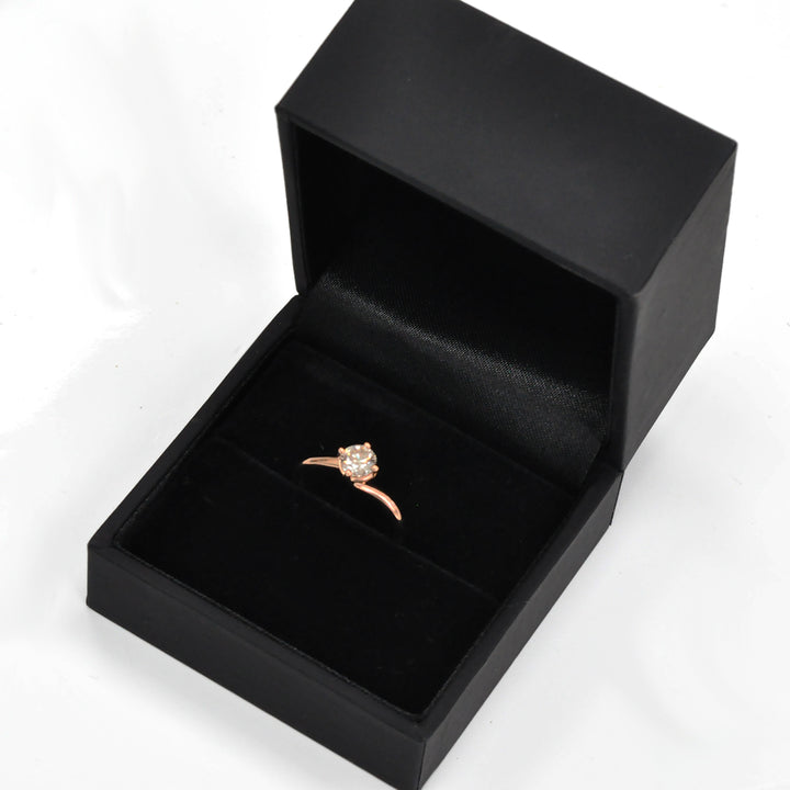 0.62 carat diamond rose gold solitaire engagement ring
