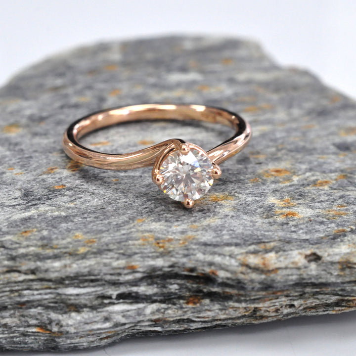 0.62 carat diamond rose gold solitaire engagement ring