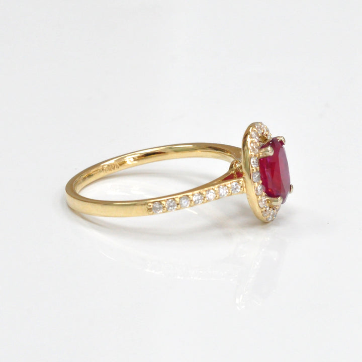 Oval cut red unheated ruby &amp; diamonds halo ring