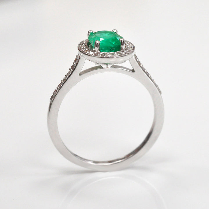 Oval Green Emerald &amp; diamonds halo ring