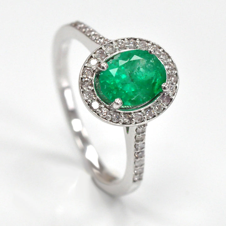 Oval Green Emerald &amp; diamonds halo ring