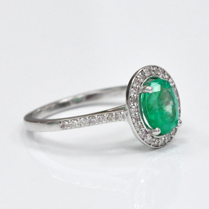 Oval Green Emerald &amp; diamonds halo ring