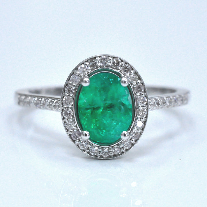 Oval Green Emerald &amp; diamonds halo ring