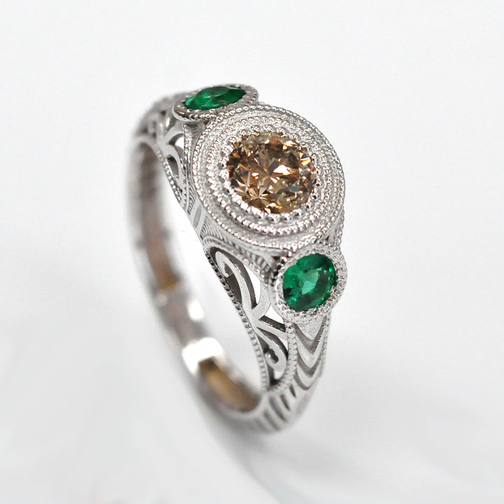 vintage style diamond and emeralds 3 stones ring