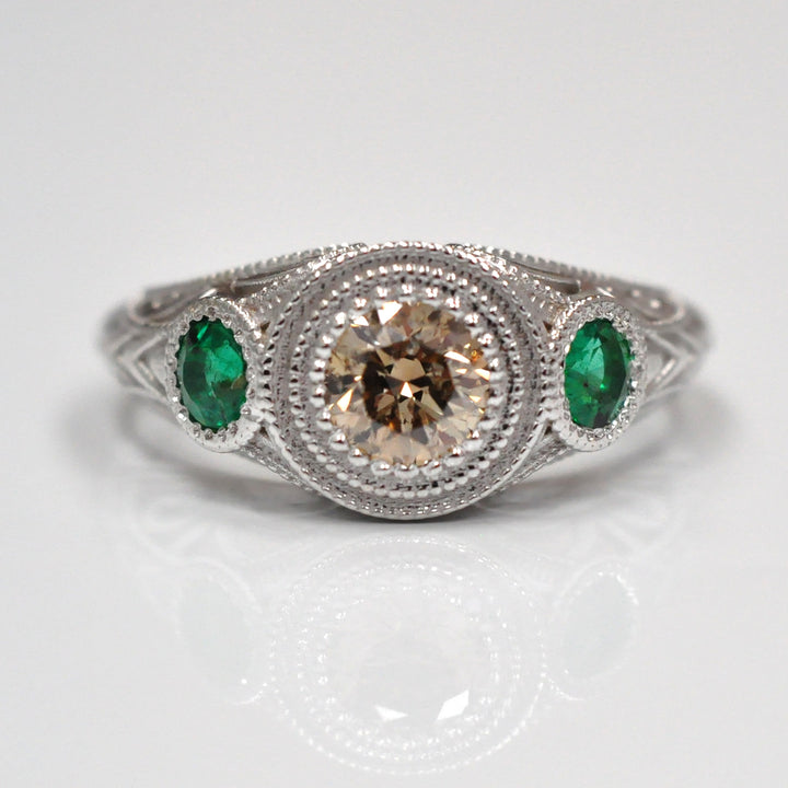 vintage style diamond and emeralds 3 stones ring
