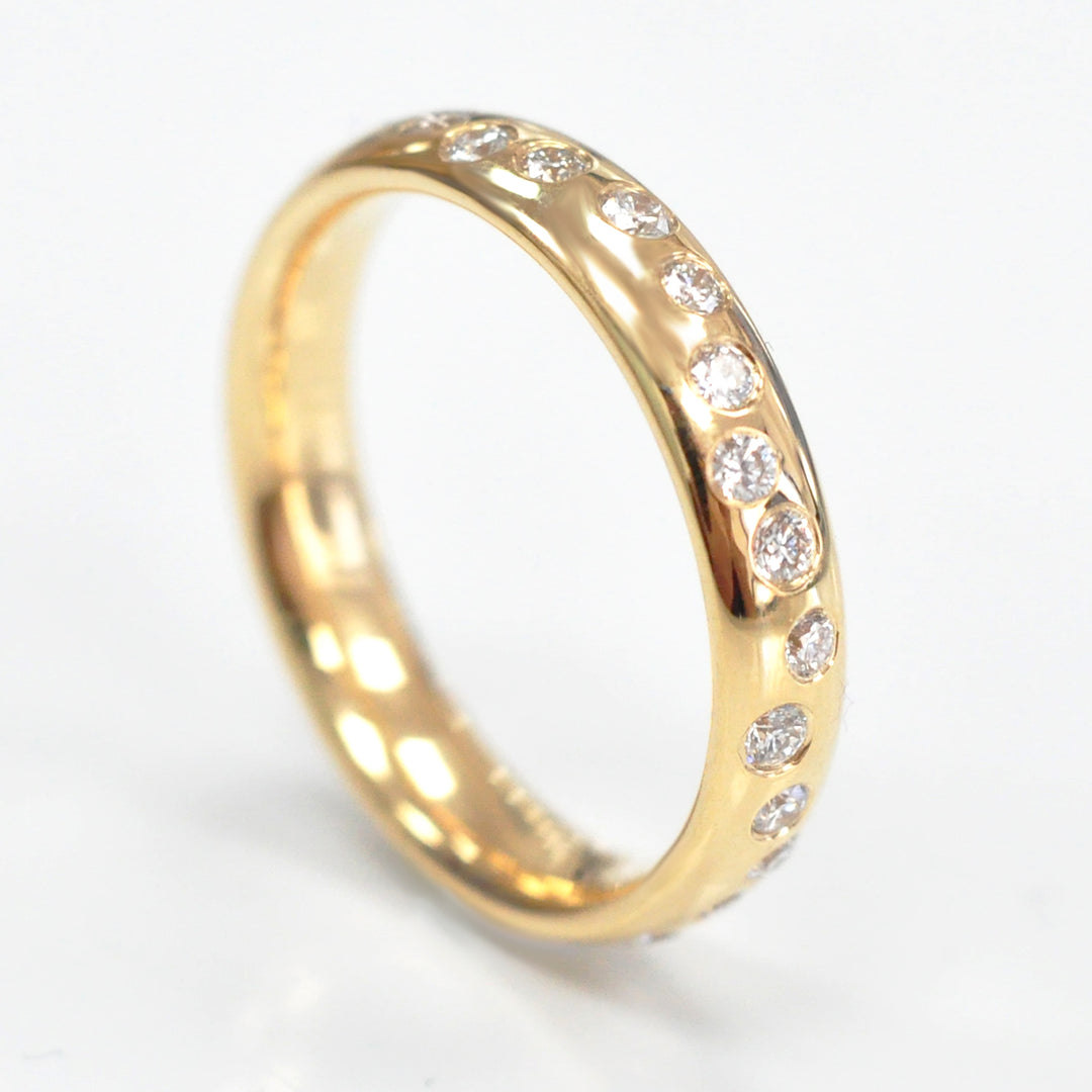 bezel set diamonds yellow gold wedding ring