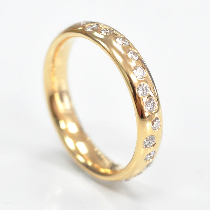 bezel set diamonds yellow gold wedding ring