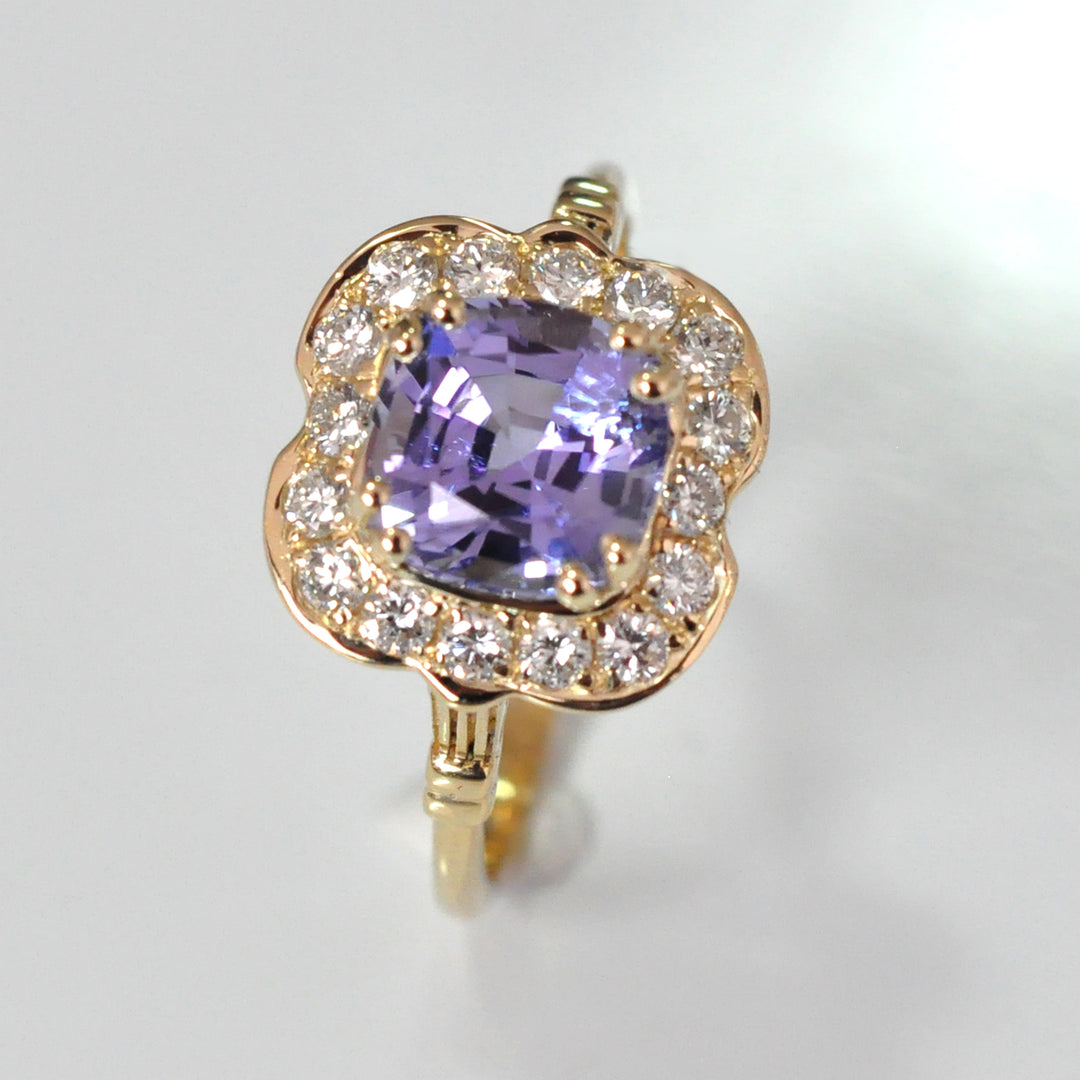 Diamonds &amp; cushion cut Tanzanite Halo ring