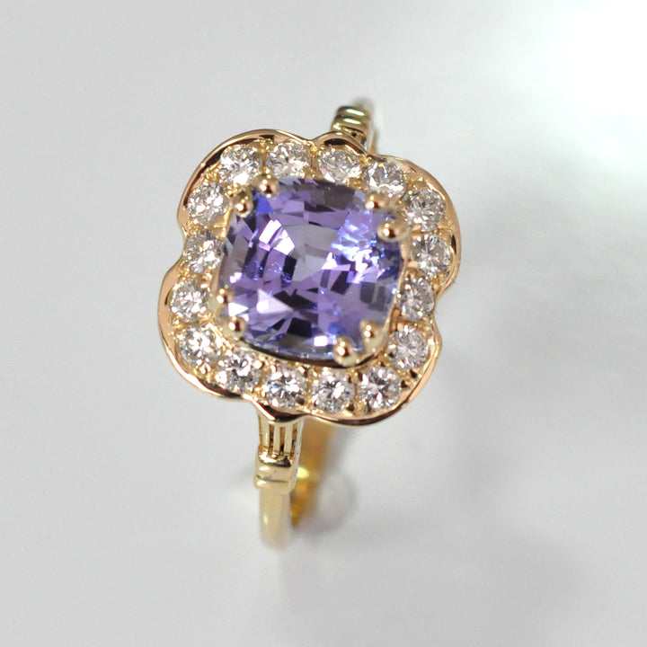 Diamonds &amp; cushion cut Tanzanite Halo ring