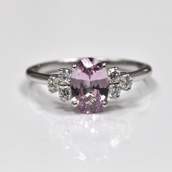 Oval Pink Sapphire and 6 Diamonds Ring