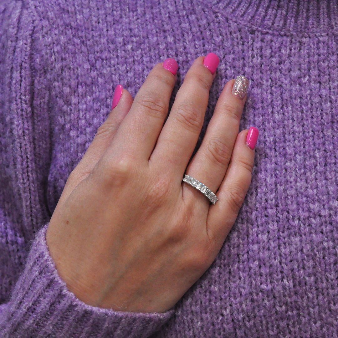 Nine baguette diamonds half eternity ring.