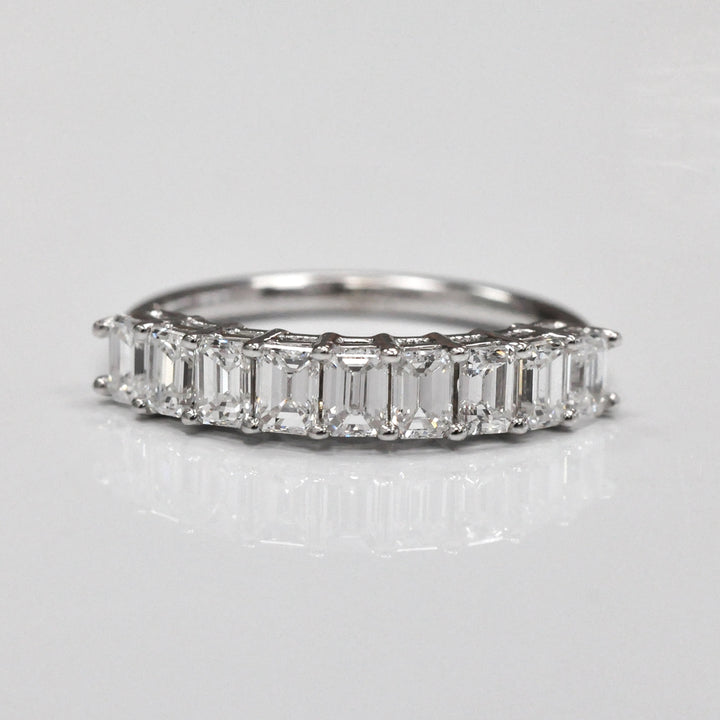 Nine baguette diamonds half eternity ring.