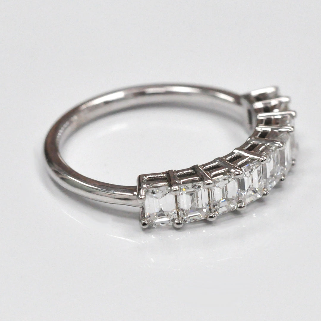 Nine baguette diamonds half eternity ring.