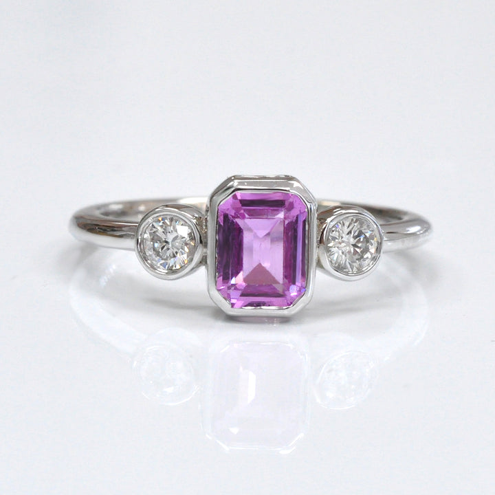 Emerald cut Pink Sapphire &amp; diamonds three stones ring