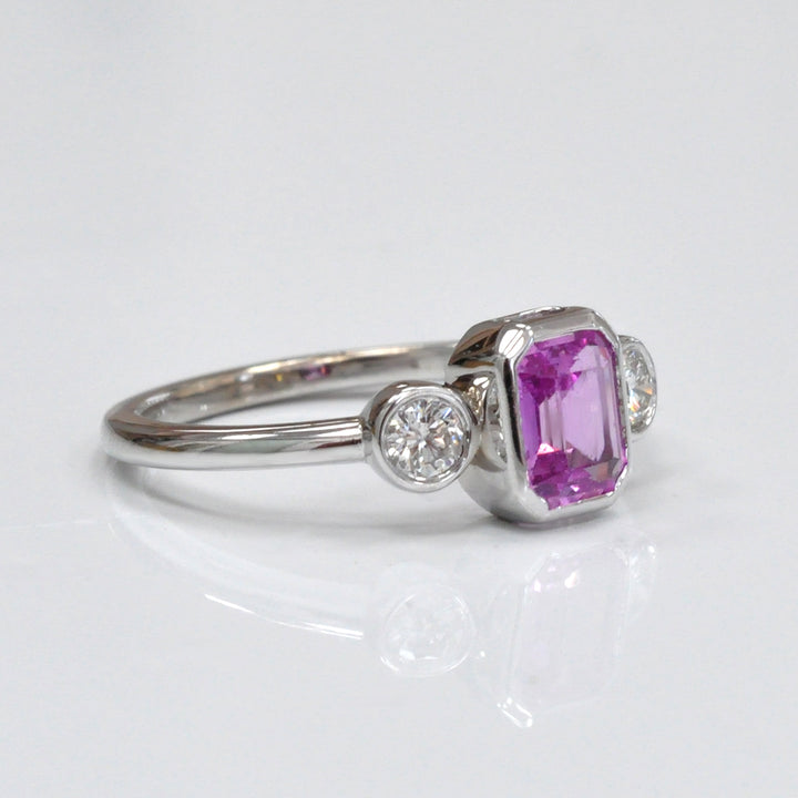 Emerald cut Pink Sapphire &amp; diamonds three stones ring