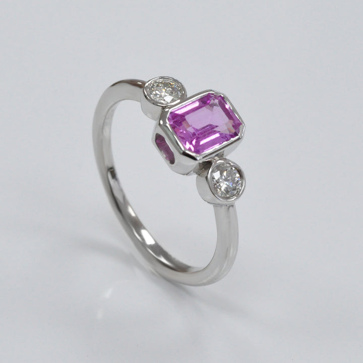 Emerald cut Pink Sapphire &amp; diamonds three stones ring