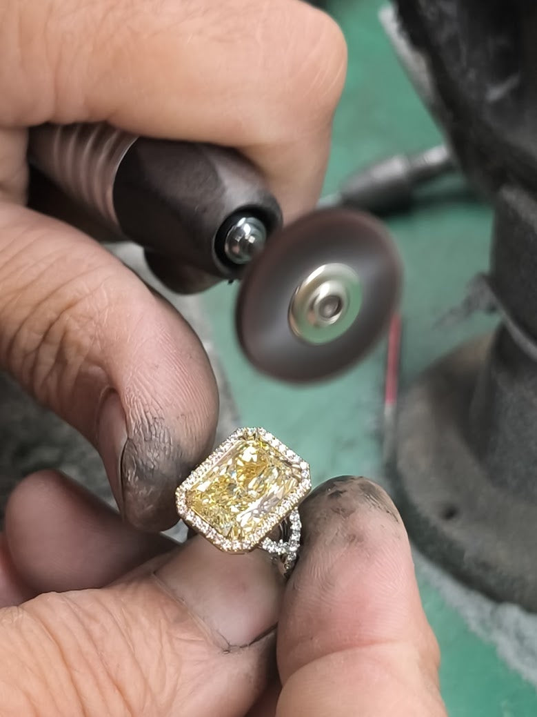 Handcrafting a yellow diamond ring in our jewelry workshop